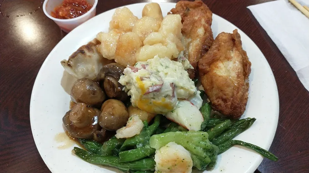Mushrooms Pot Stickers Creamy Cheesy Potatoes Chicken Wings Broccoli and Shrimp